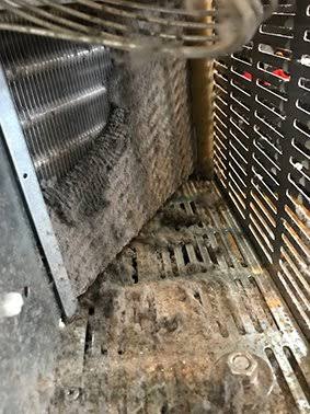 Ice machine evaporator coil diagnosed for repair